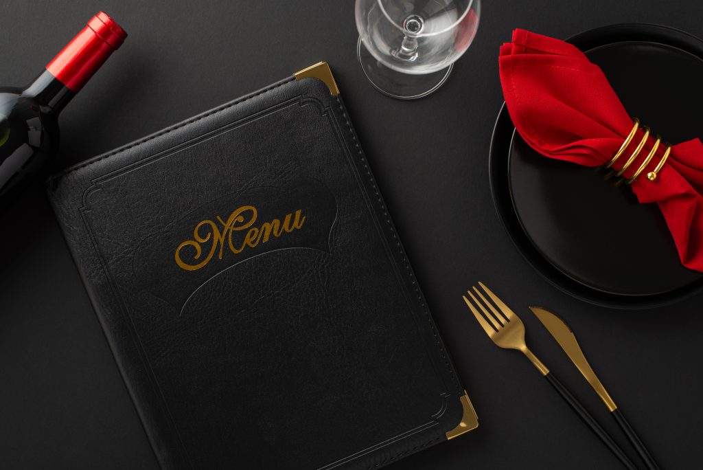 Black Friday special at luxurious restaurant: Top view of meticulously arranged table